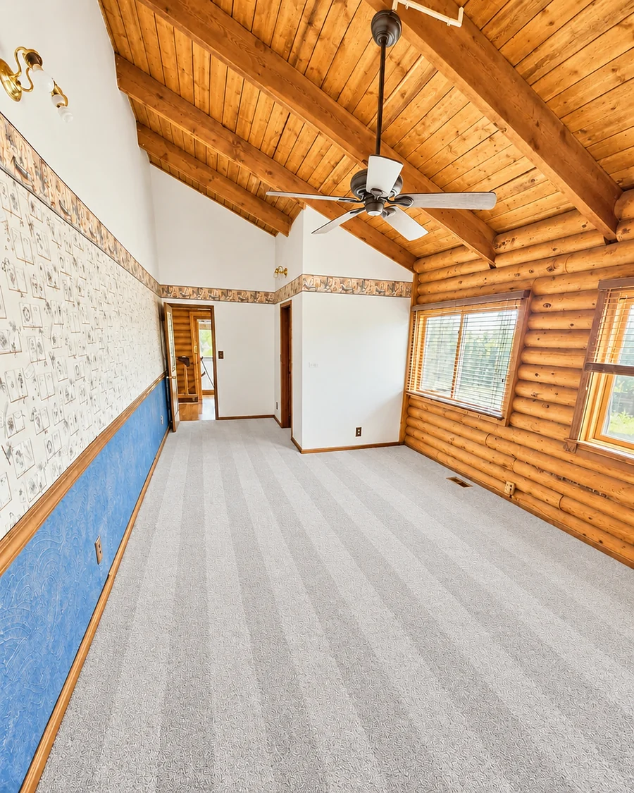 New carpet with fresh vacuum lines under a vaulted ceiling