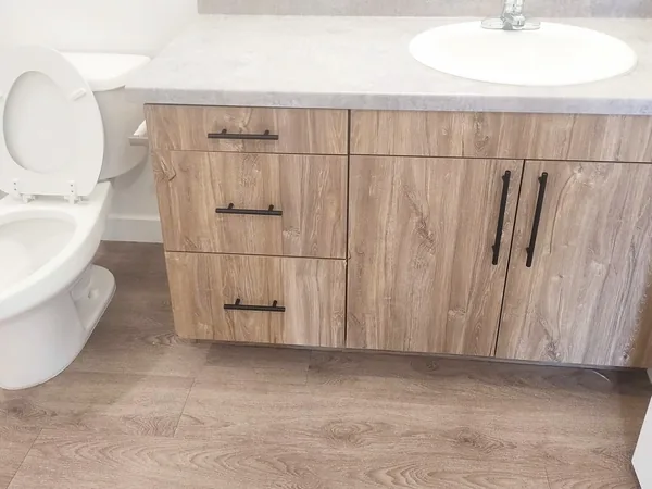 Bathroom vanity and floor after a Wasatch Cleaners move-out clean