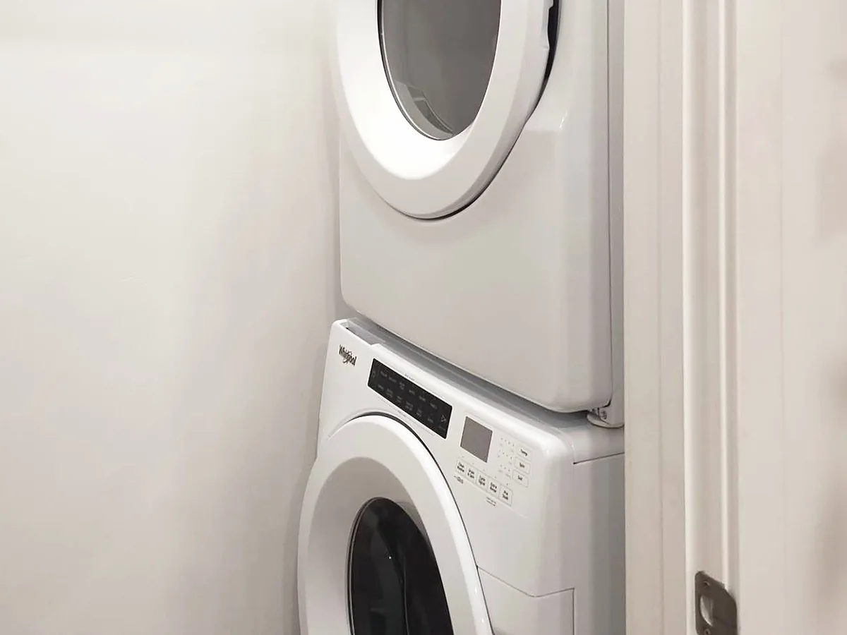 Laundry closet after a move-out clean, photographed by the Wasatch Cleaners crew
